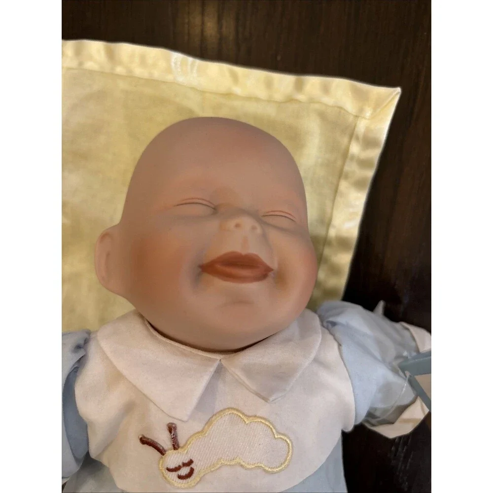 Ashton Drake tickles porcelain